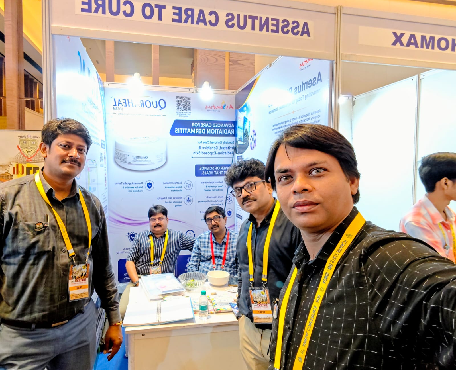 Asentus Biogenics team at the Quoraheal Cream exhibition booth